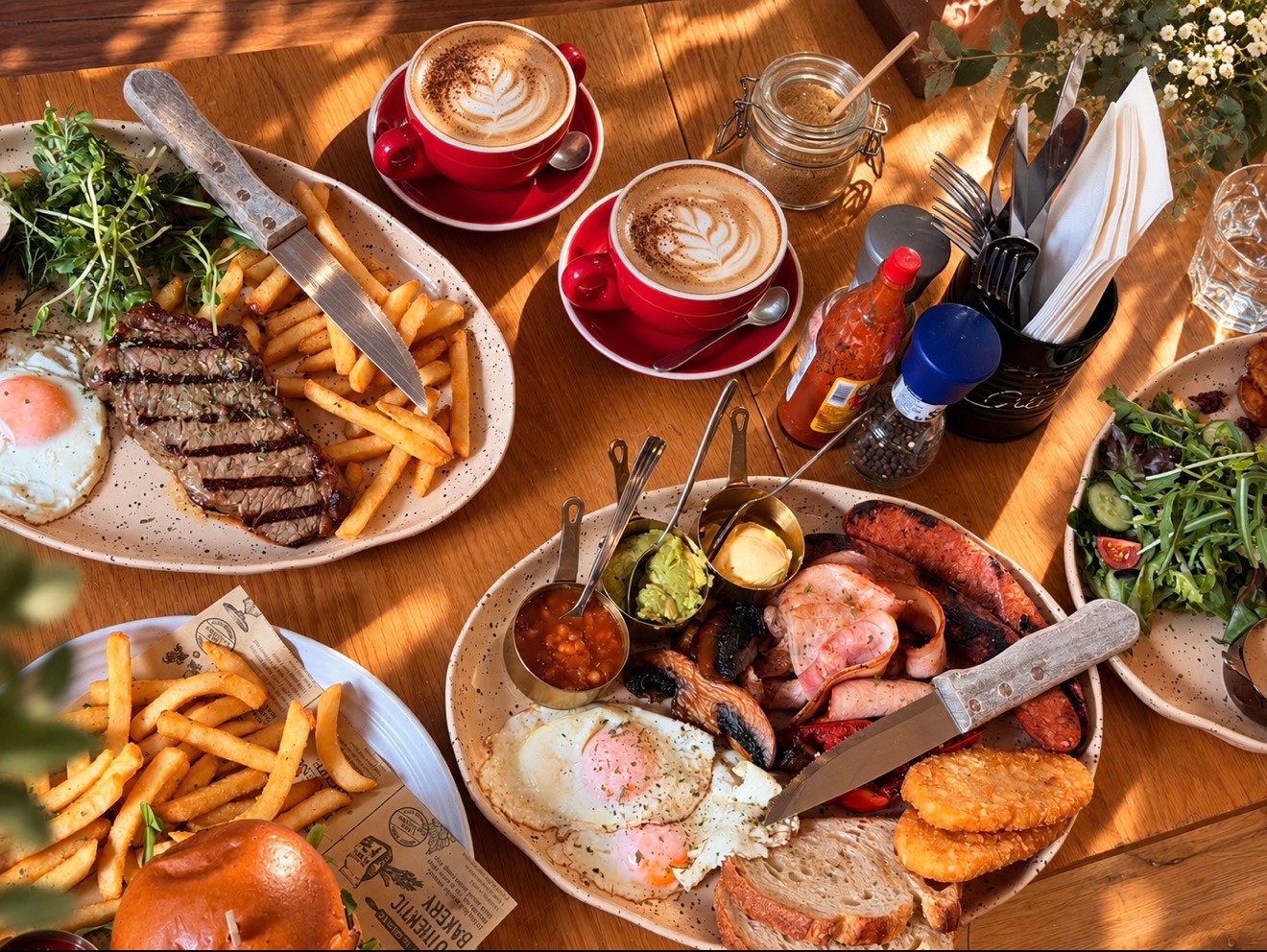 Brunch dishes and coffee on a wooden table